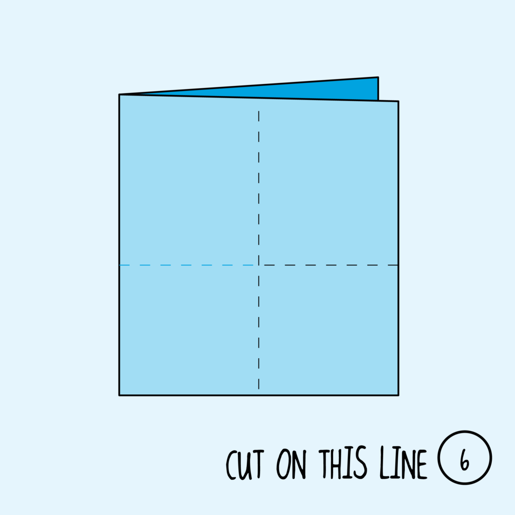Making zine instructions, step 6 (hold in half along short side, cut along center unfolded line)